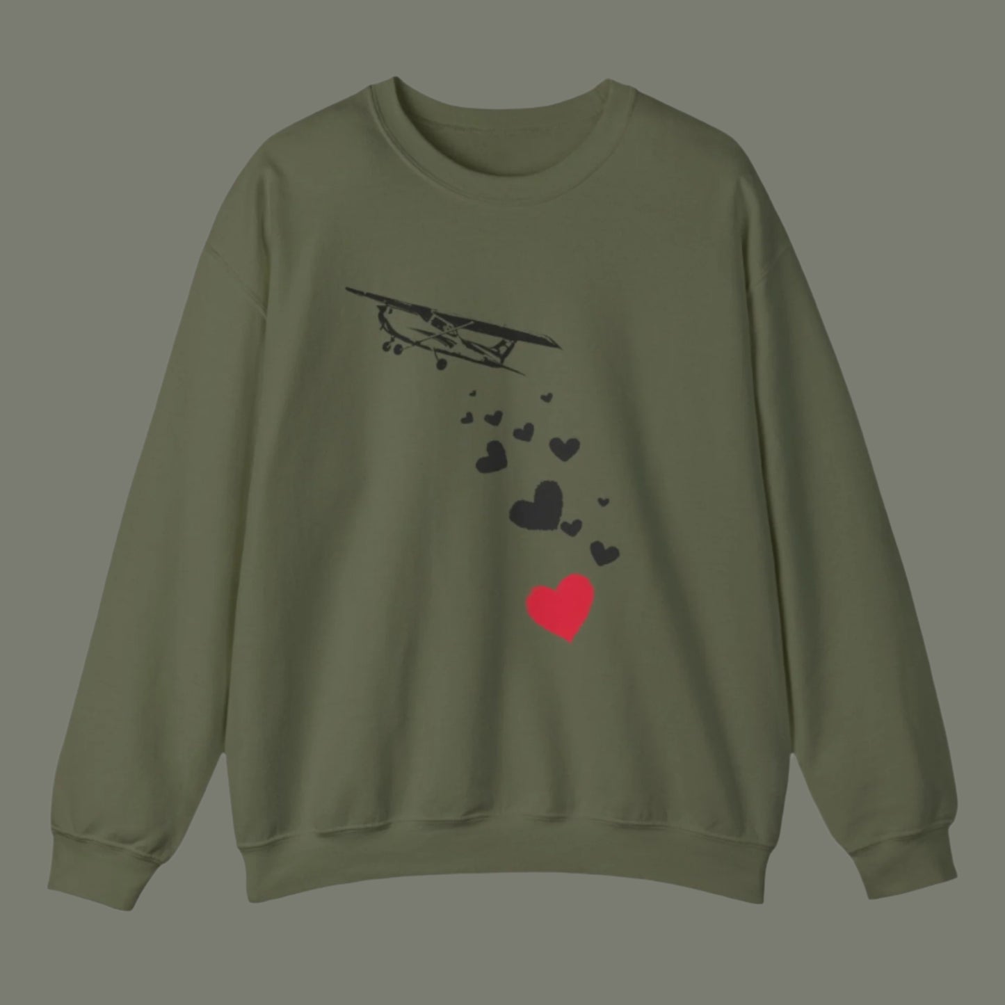 Sweatshirt of airplane dropping hearts