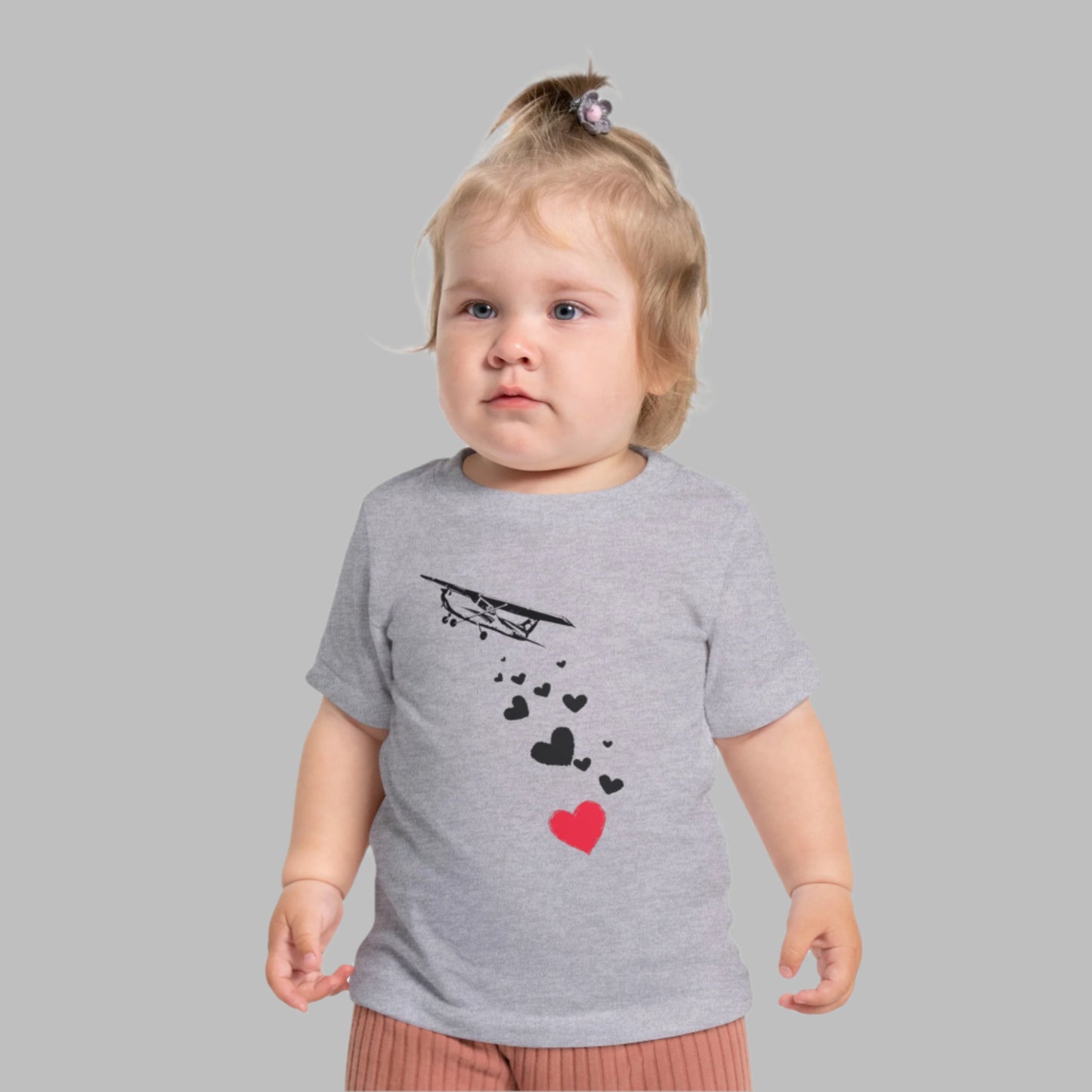 Baby wearing airplane tee