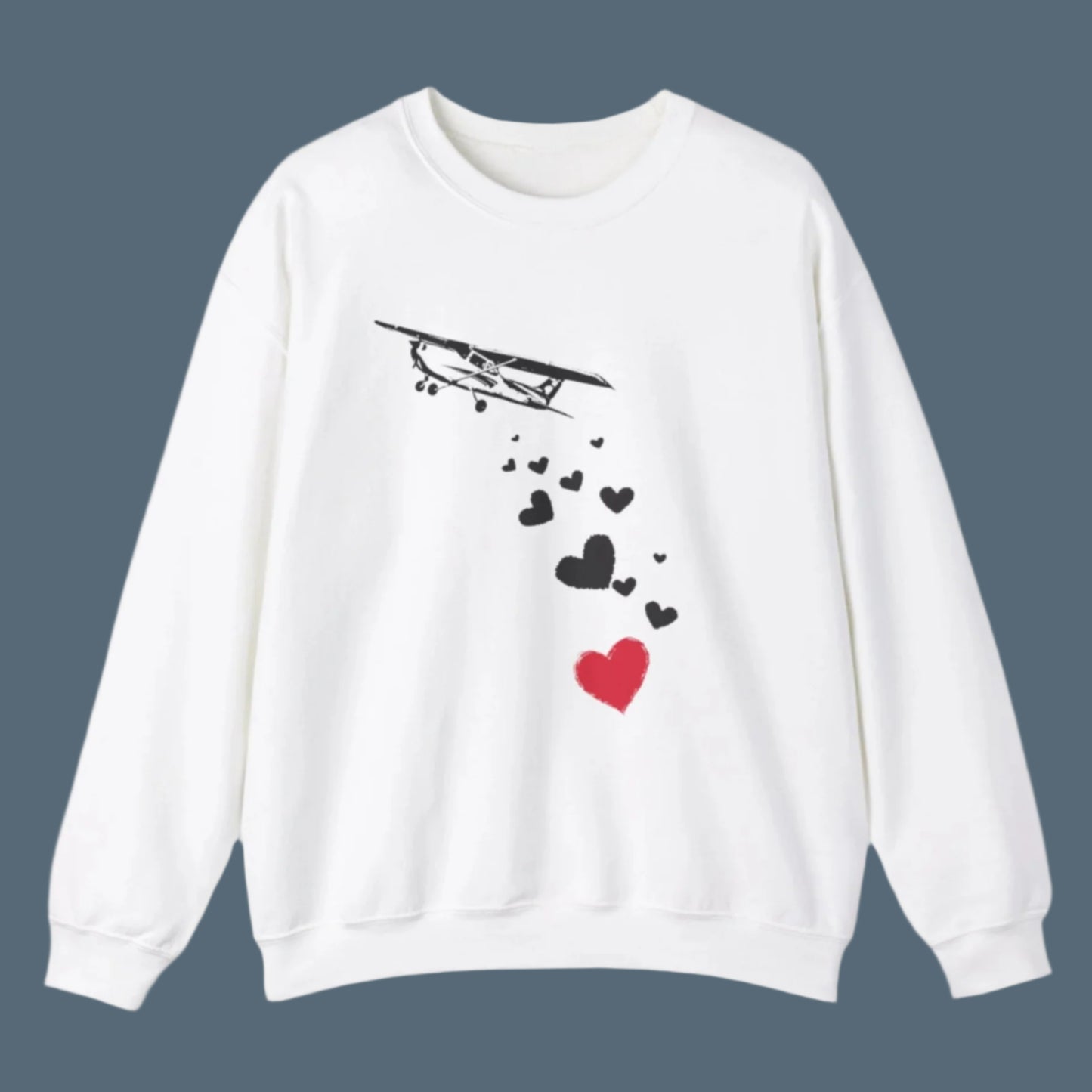 Sweatshirt of airplane dropping hearts