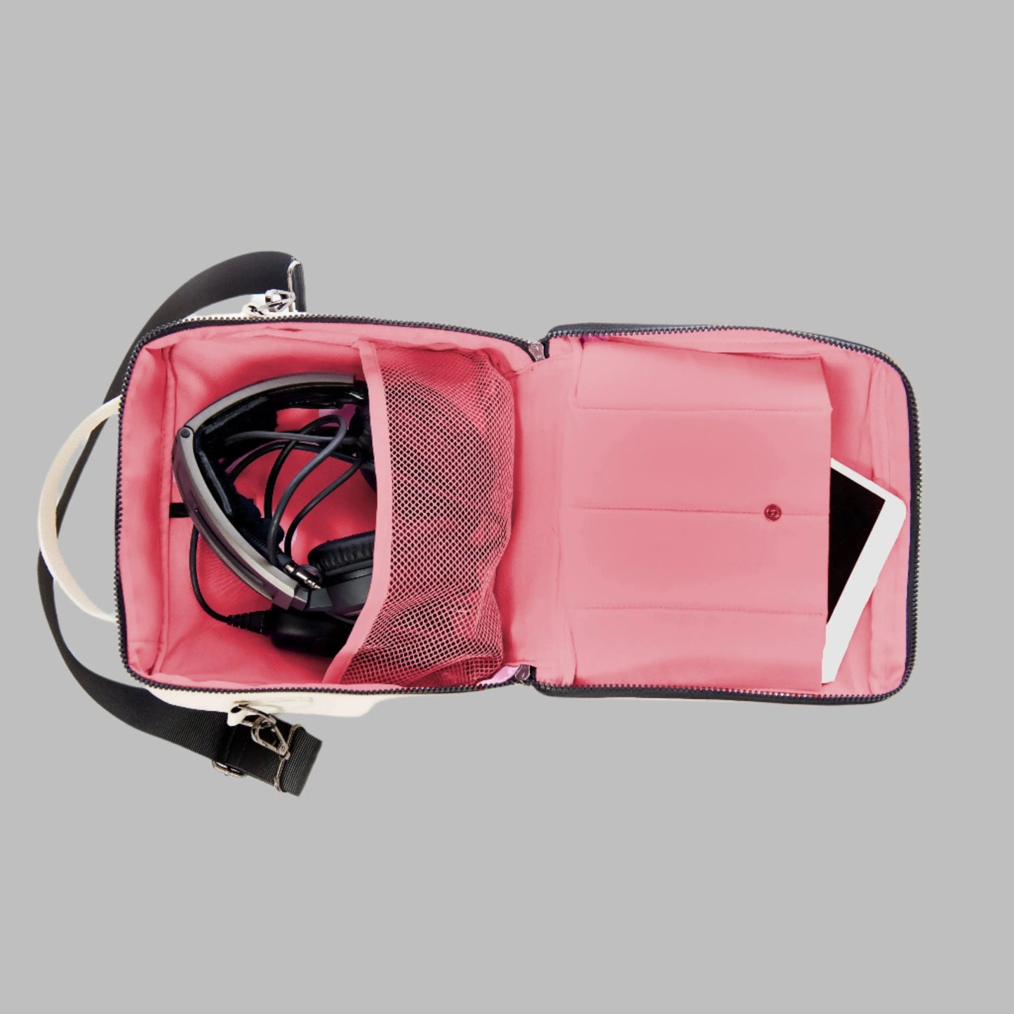interior of women's flight bag with headset