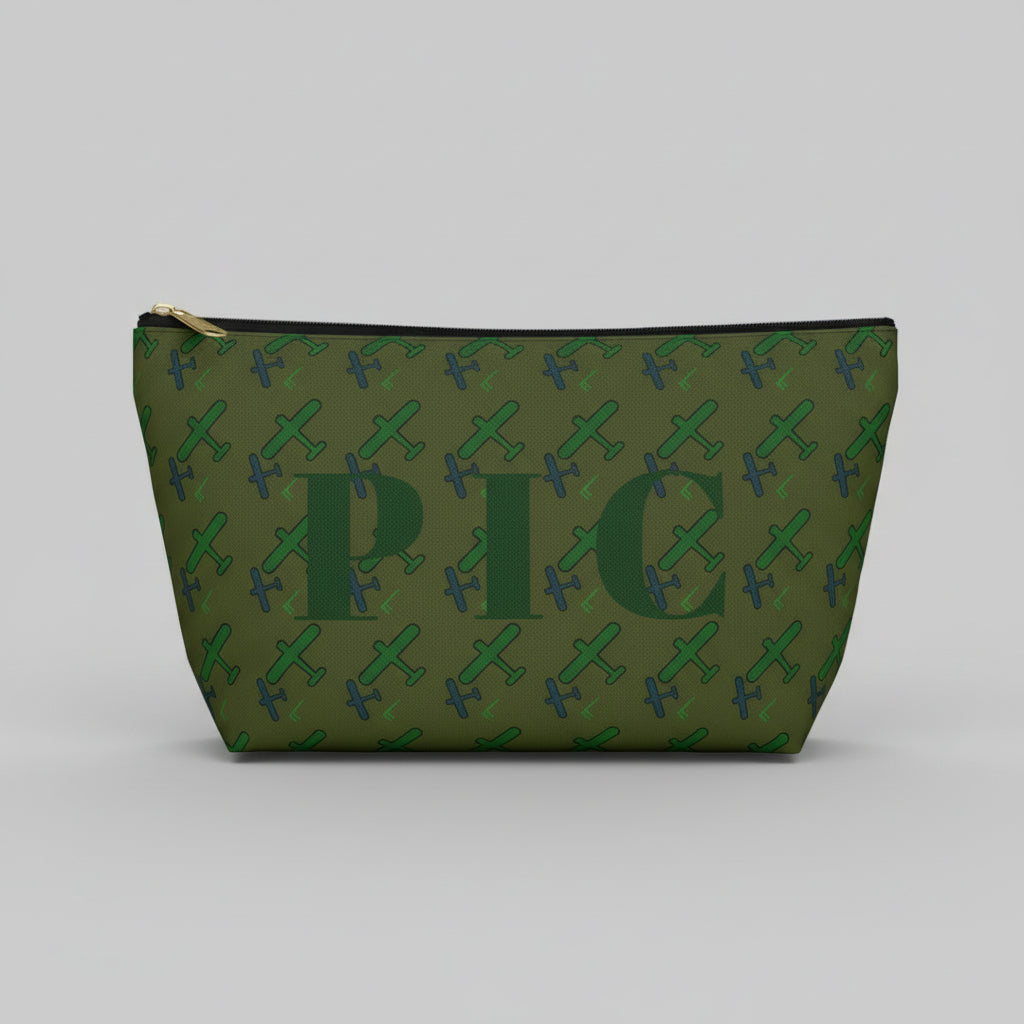 Green pouch with airplane pattern and 'PIC' text on a white background