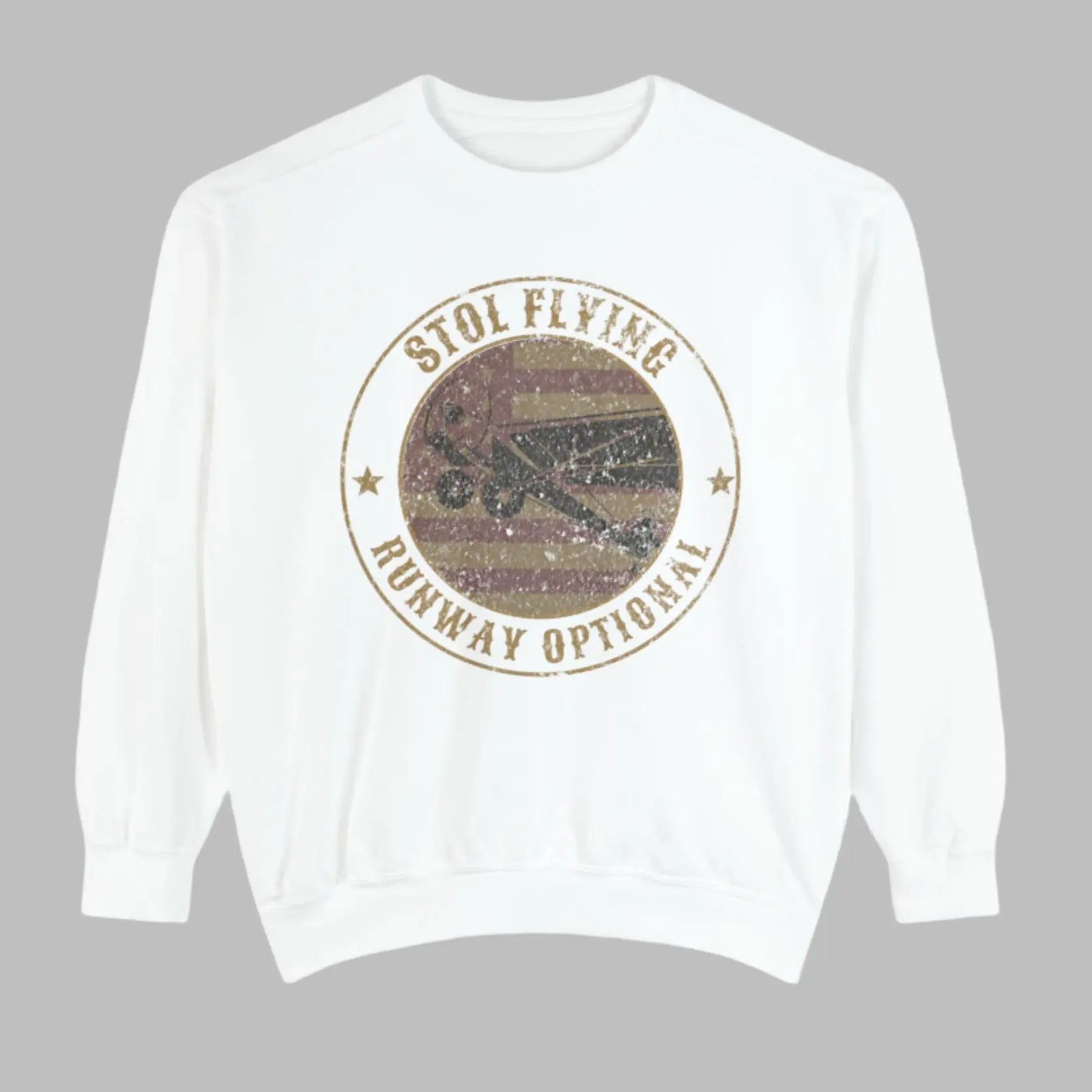 A white sweatshirt with a graphic of a Piper Super Cub and the text 'STOL FLYING - RUNWAY OPTIONAL' in a circular design.