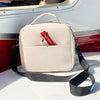 close up of women's flight bag