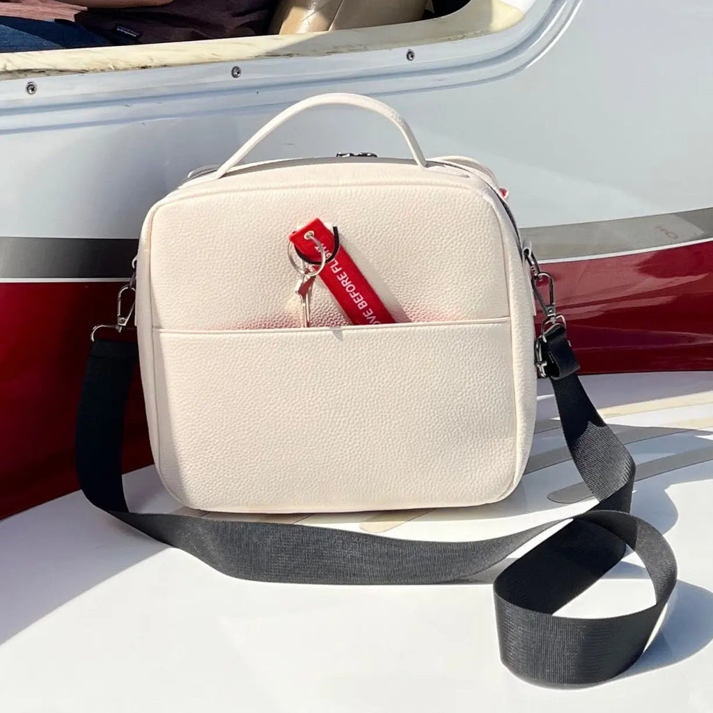 close up of women's flight bag